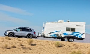 2020 Honda Passport towing a trailer.